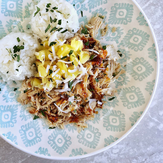 hawaiian kalua pork with rice and pineapple and sauce