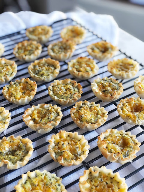 mini phyllo shells filled with cheese and egg quiche