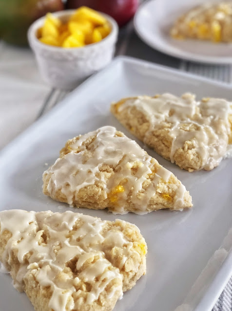 mango almond scones on a white plate
