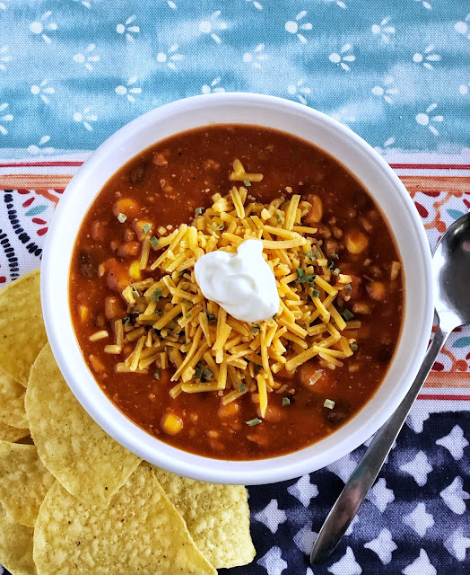 taco soup with cheese and sour cream