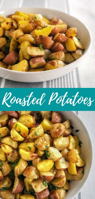 roasted potatoes with parsley in a white bowl
