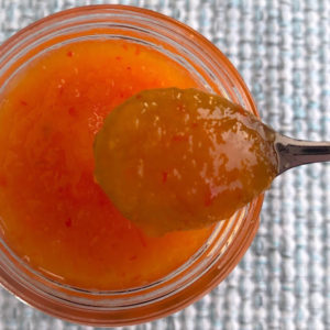 orange sauce in a glass jar