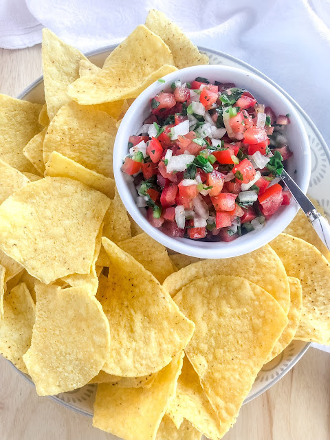 pico in a white bowl with tortilla chips
