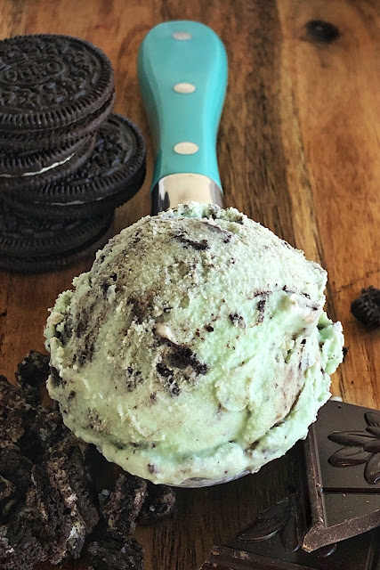 ice cream in a scoop with chocolate and oreos