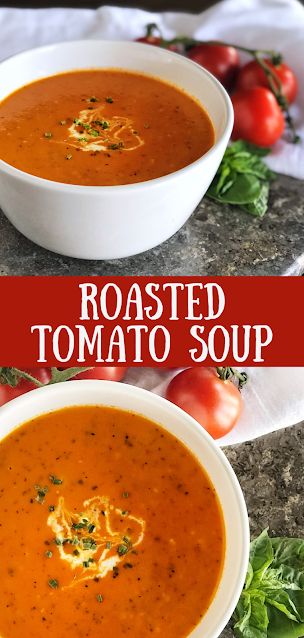 Roasted Tomato Soup in a white bowl with tomatoes and basil on the side
