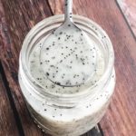 spoonful of dressing over a jar