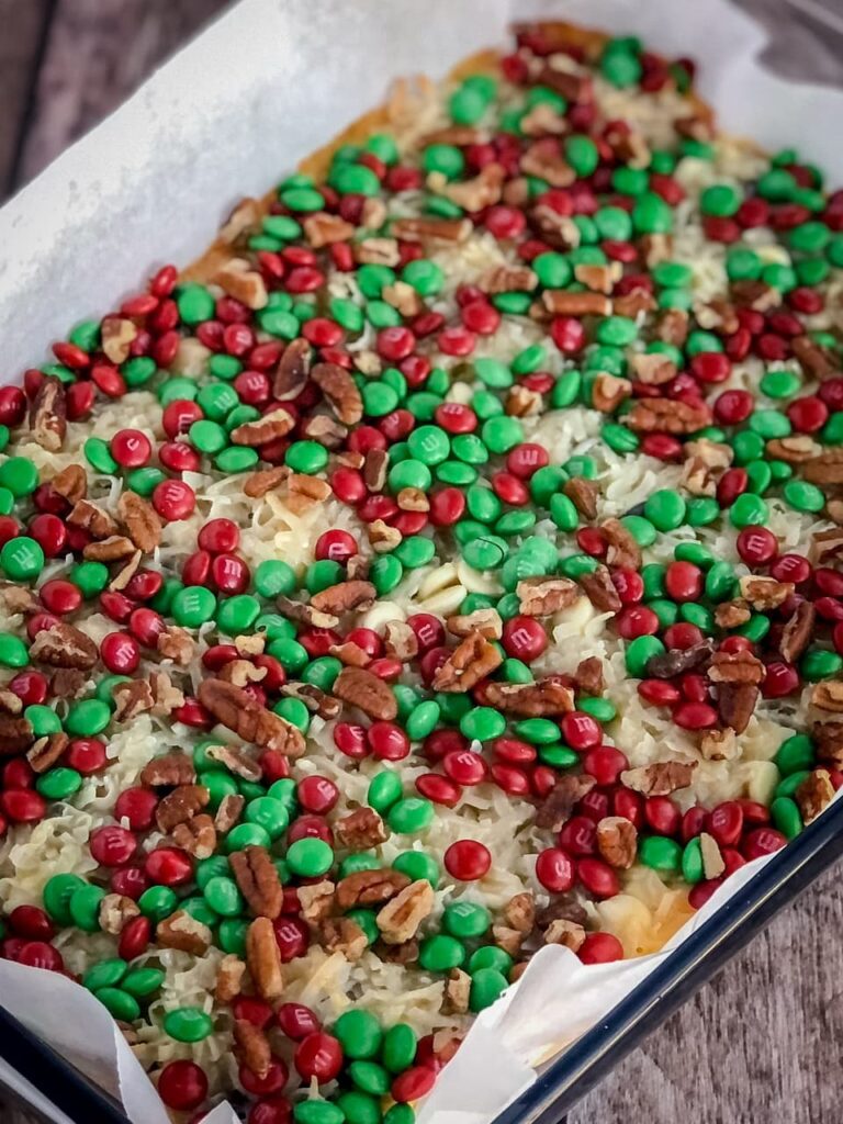 red and green m&ms on cookie bars