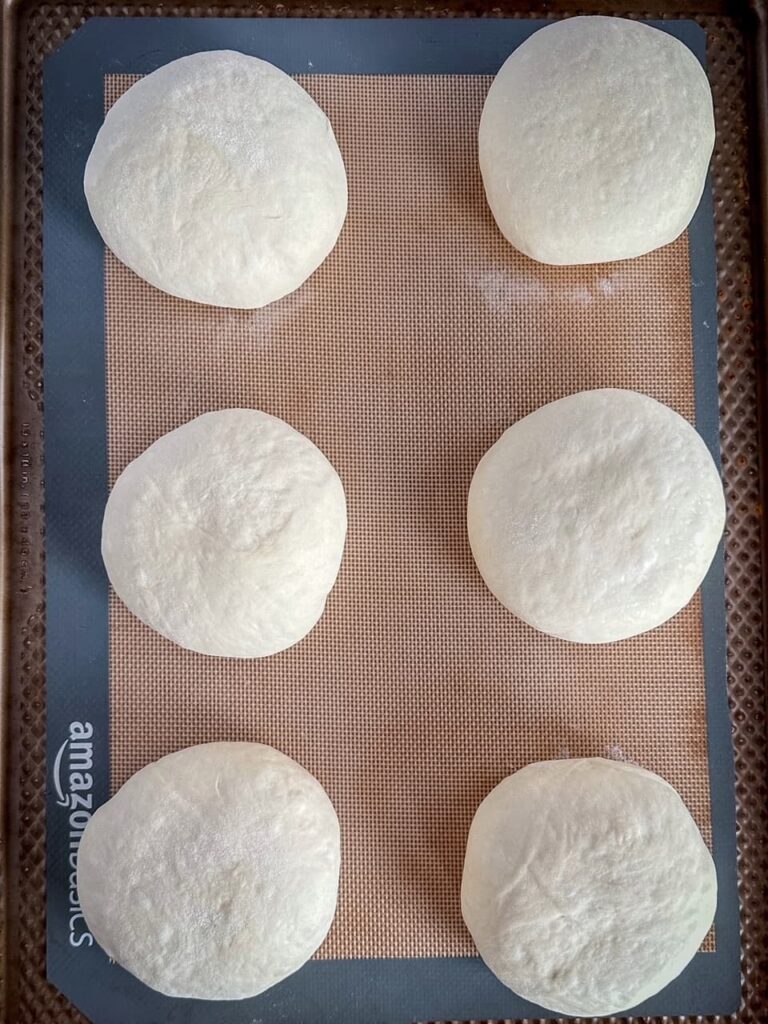 bread bowl dough on a baking sheet