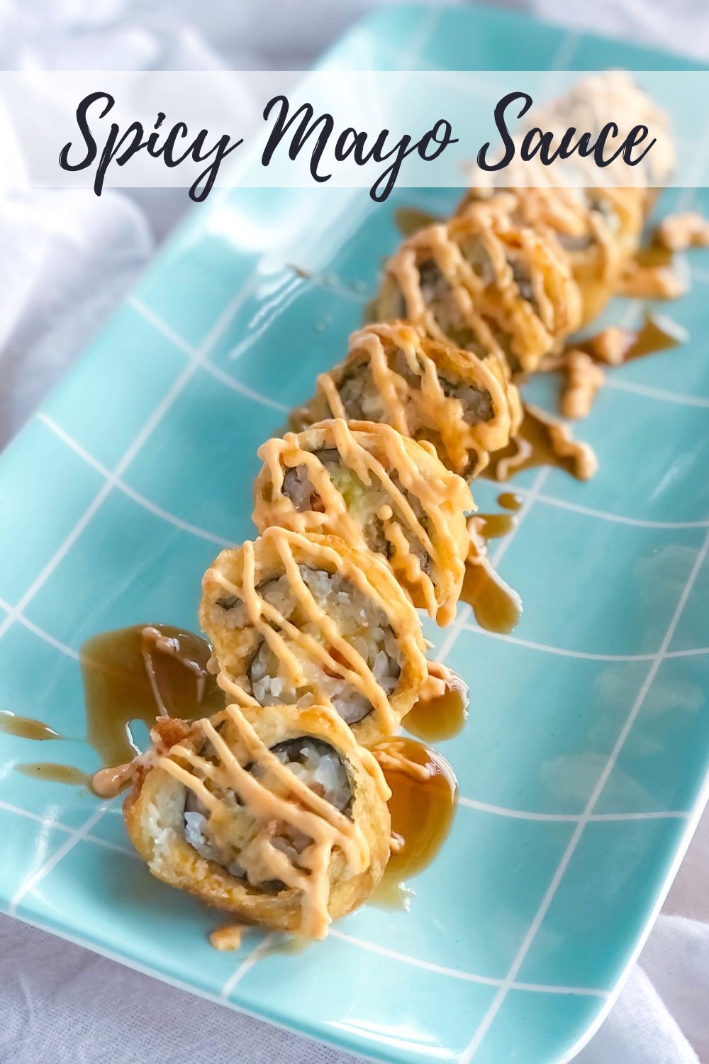 spicy mayo sauce on a sushi roll