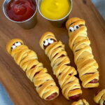 mummy hot dogs with candy eyes