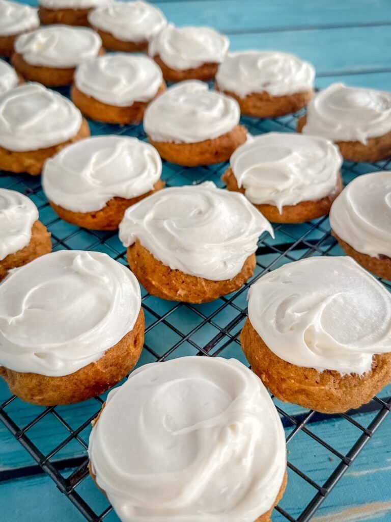pumpkin cookies with frosting side view