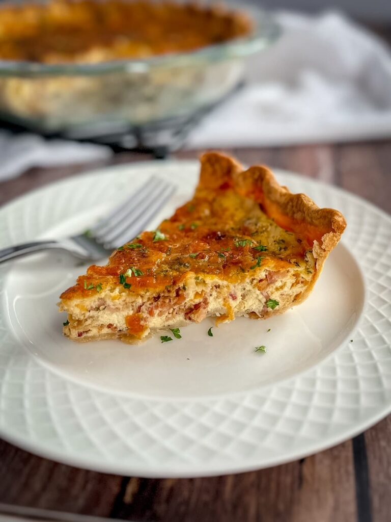 slice of quiche on a white plate