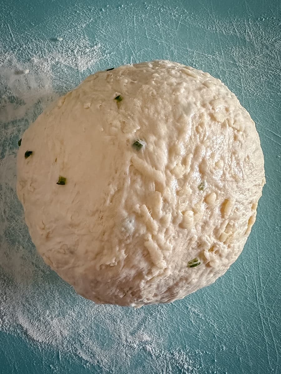 dough flipped and shaped in to a ball