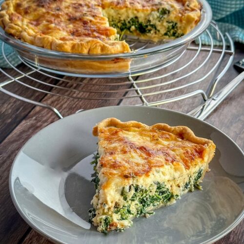 spinach gruyere quiche on a plate