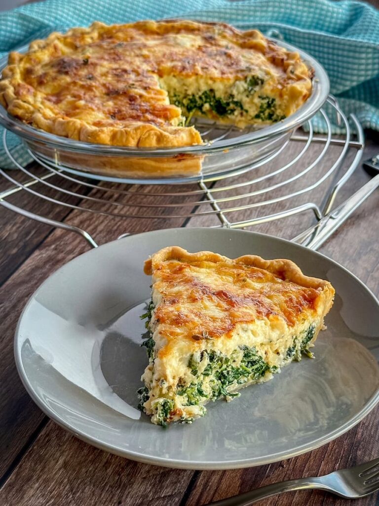 spinach gruyere quiche on a plate