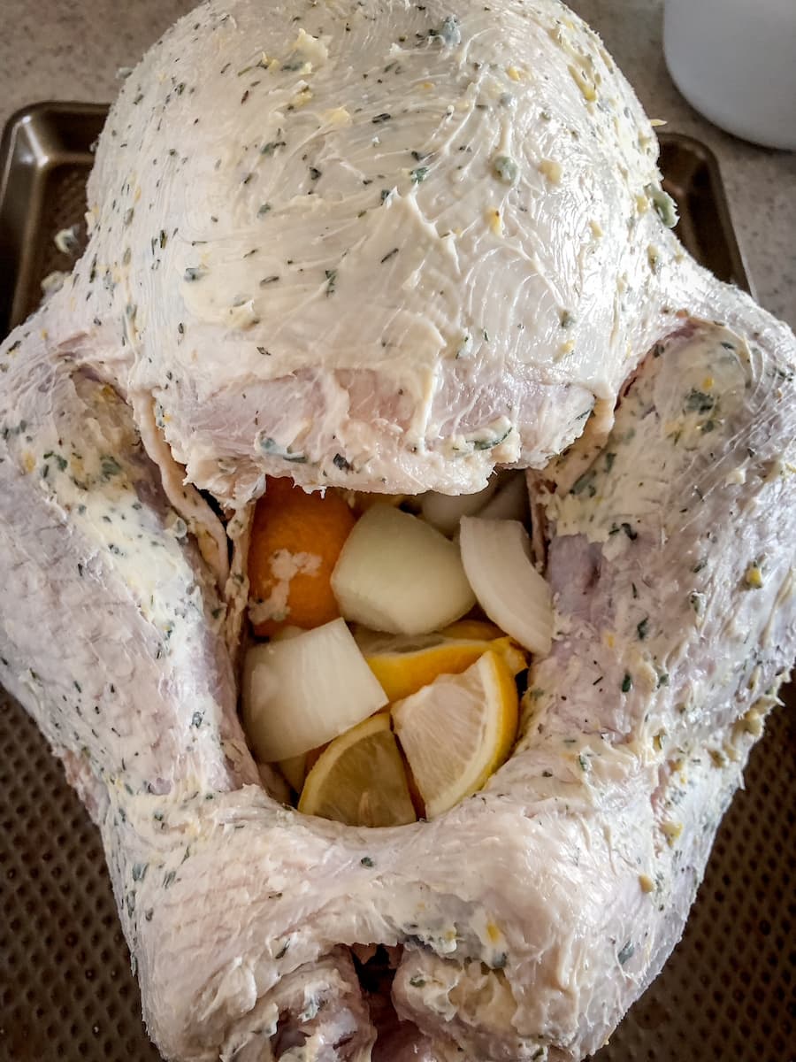 buttered turkey with lemon and onion