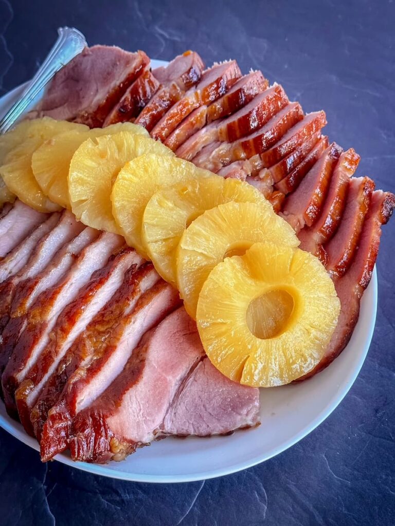 sliced baked holiday ham with pineapple