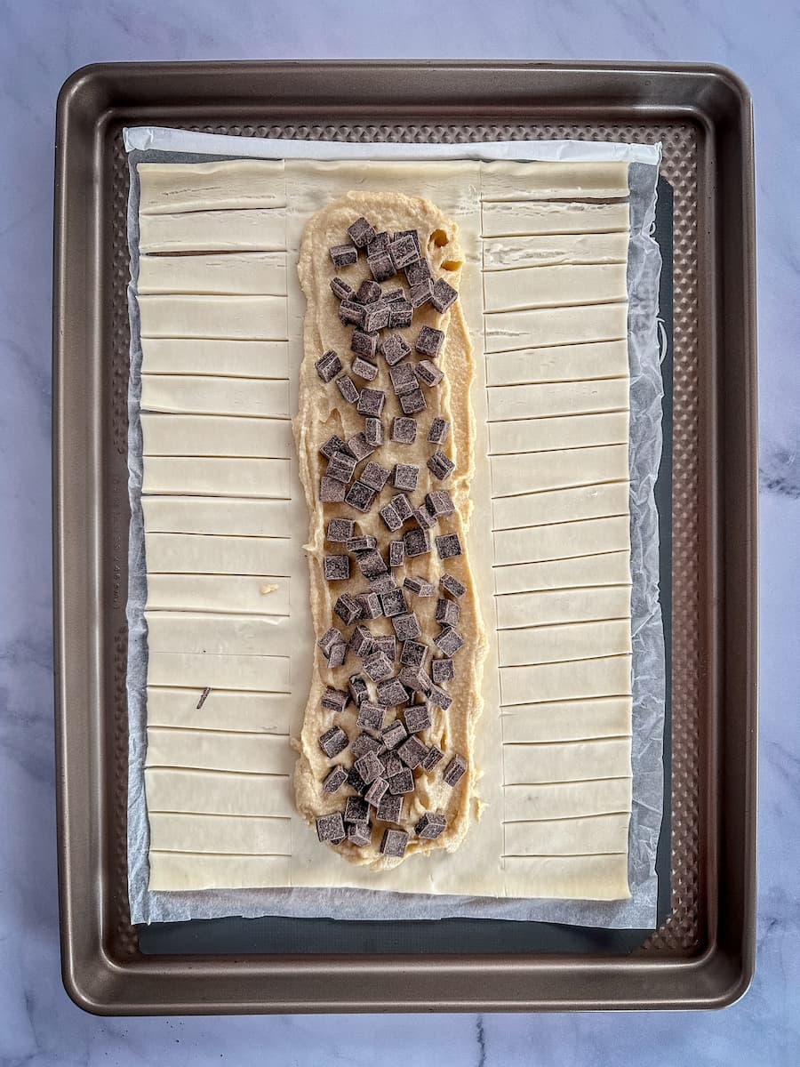 assembling the chocolate almond croissant pastry