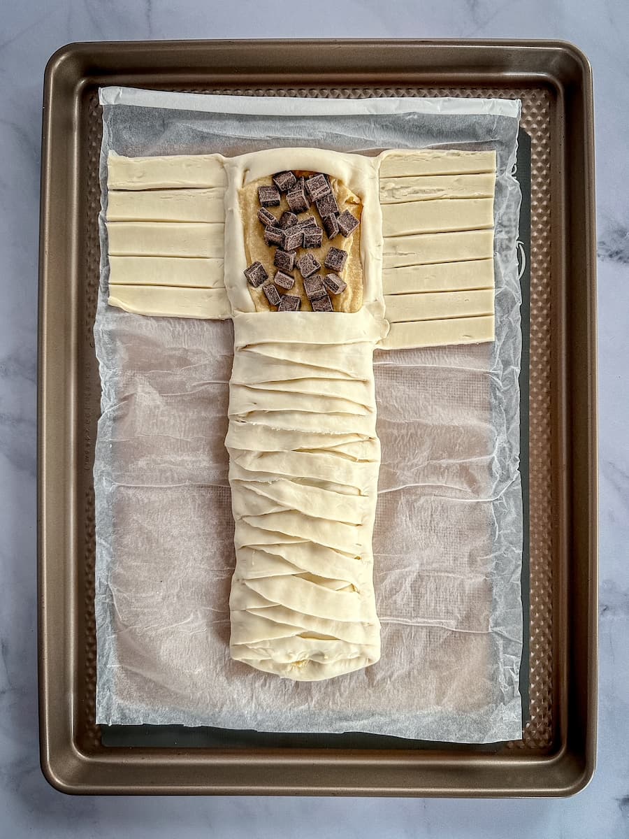 braiding the chocolate almond croissant pastry