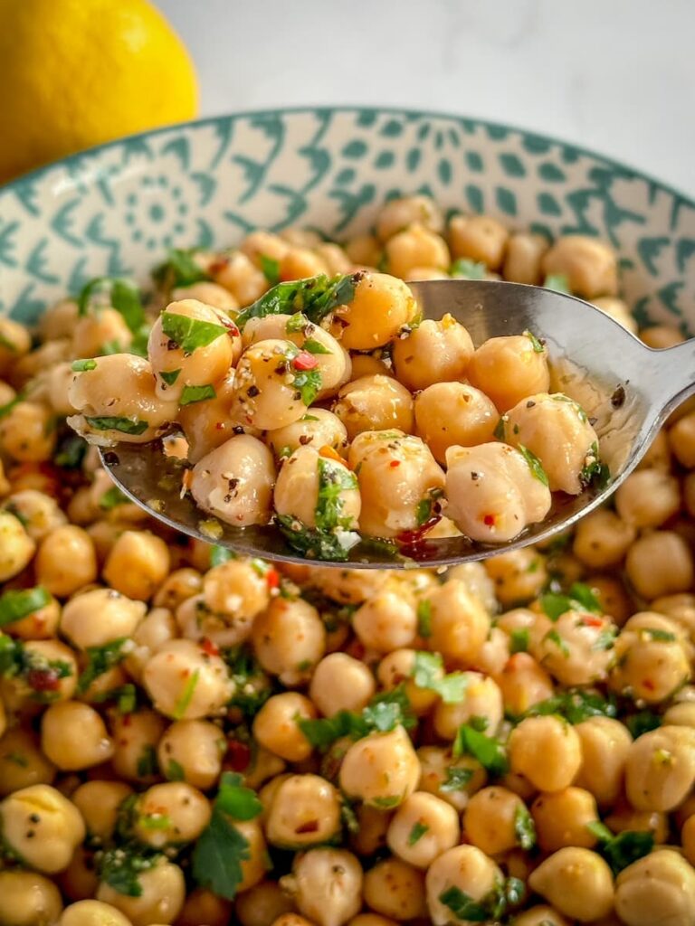 lemon herb chick pea salad on a spoon