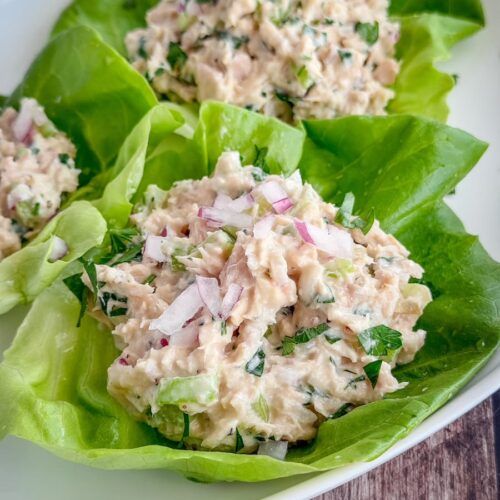 Creamy homemade classic tuna salad made with white albacore tuna, celery, red onion, parsley, mayonnaise, Dijon mustard, and lemon juice served in lettuce cups