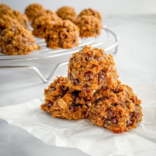Close-up of pumpkin chocolate chip breakfast bites made with oats, peanut butter, pumpkin and mini chocolate chips.
